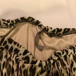 Chiffon , lined pleated animal print skirt.